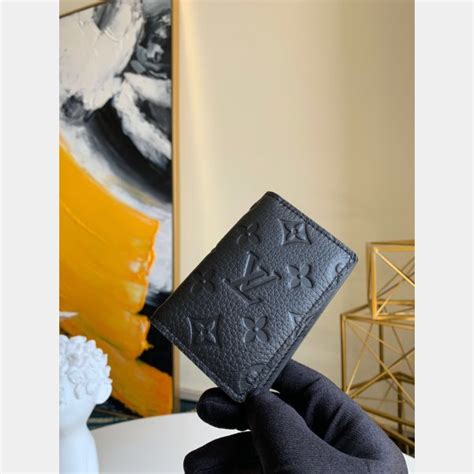 louis vuitton pocket organizer fake